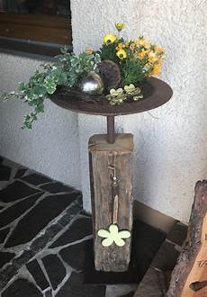dekorieren mit holz altholzbalken mit edelrost schale und bodenplatte rund dekorieren mit holz altholzbalken mit edelrost schale und bodenplatte rund
