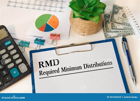 Paper with Required Minimum Distributions RMD on a Table Stock Photo - Image of development ...