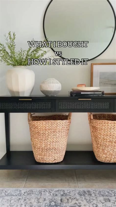 Entryway console table decor. Black entry table styling ideas. Modern ...