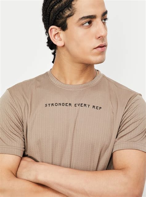 Buy Men Textured Sports T-shirt Online at just Rs. 699.0 ...