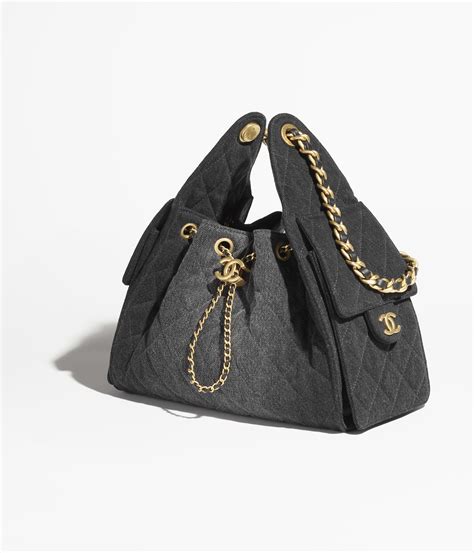 Chanel 25 small handbag, Washed denim & gold-tone metal, black ...