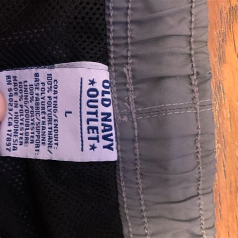 Old navy track pants size L... - Depop