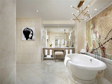 The Ritz-Carlton bath mat hung over standing bathtub