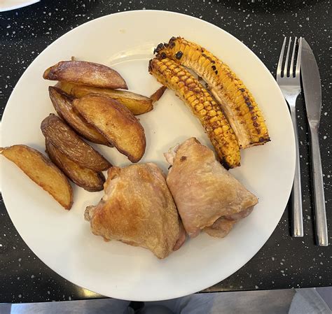 calories in my dinner? (2 chicken thighs skin on, potato wedges, un ...