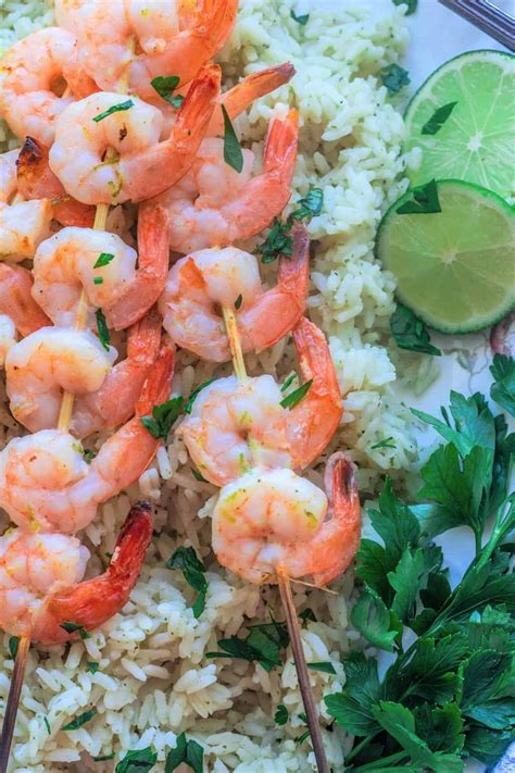 skewered marinated shrimp with cilantro lime rice on a platter | Lime ...