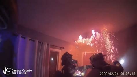 Helmet cam video | Firefighters rip down ceiling to fight fire | ksdk.com