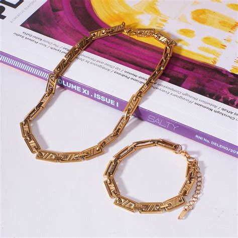 Edgy Elegance Golden Modern Necklace & Bracelet Set | Salty – Salty ...