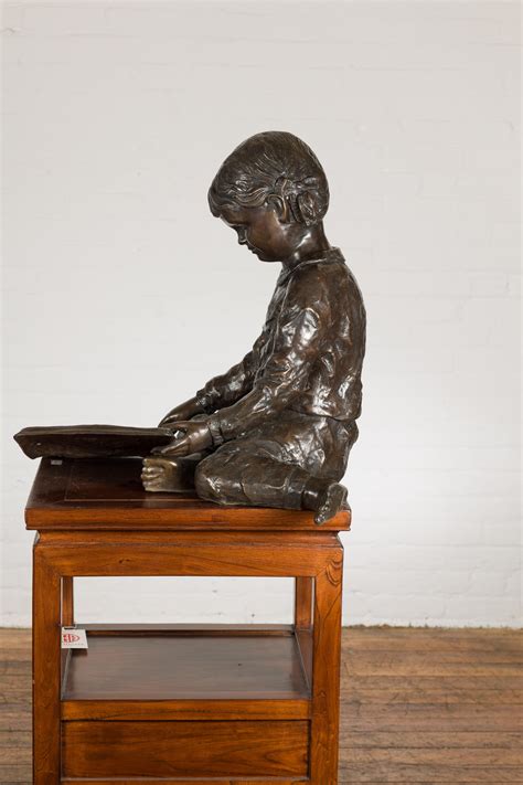 Nursery Rhymes, Lost Wax Cast Bronze Sculpture of a Little Girl Reading a Book For Sale at 1stDibs