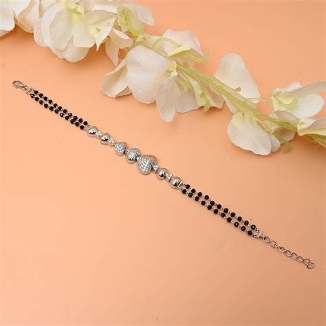 Elegant Silver Mangalsutra Bracelet for Girls – Heart Shape Silver Bud ...