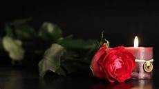 candele rosa and candle on black background stock footage candele rosa and candle on black background stock footage