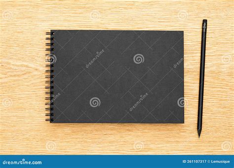 Black Paper Notebook on Oak Wood Desk Background Stock Image - Image of ...