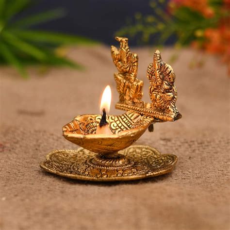 Buy Blessing Laxmi Ganesh Statue With Palm Shaped Diya Oil Lamp Puja ...