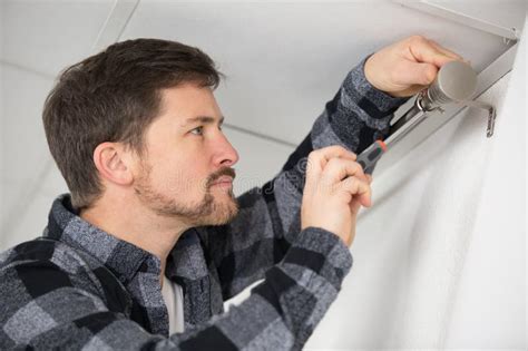 Installing Window Curtain 的图像结果