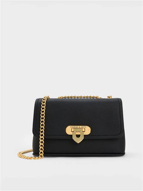 Bolso Alcott con cierre de botón a presión y cadena - Negro - CHARLES & KEITH US
