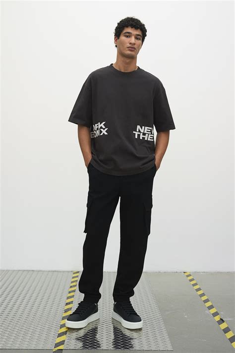 Loose Fit Washed T-shirt - Dark grey/The Bronx - Men | H&M IN