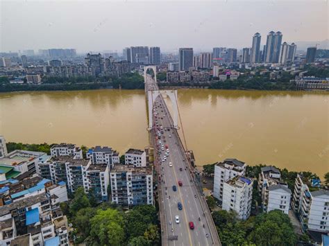 城市中午柳州红光大桥洪水楼顶无人机摄影图配图高清摄影大图-千库网