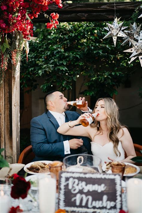 Mexican Wedding - with a boho twist - Bride & Groom cheers with Modelo ...