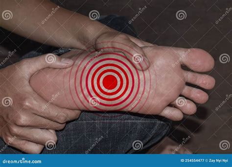 Tingling And Burning Sensation In Foot Of Asian Man. Foot Pain. Sensory Neuropathy Problems ...