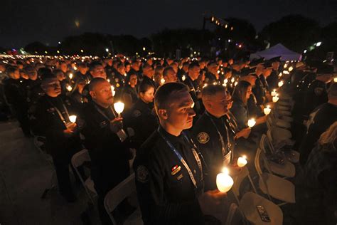 Thousands gather at candlelight vigil on first evening of National ...