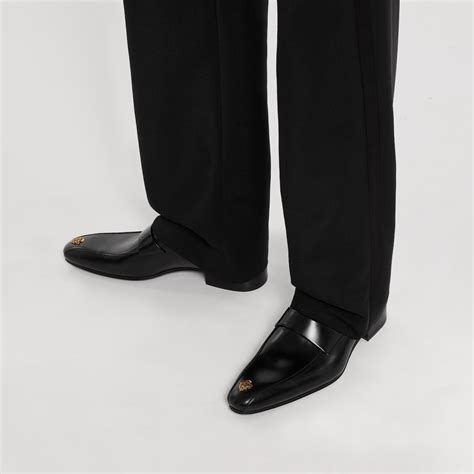 Men's loafer with Gucci Crest in black leather | GUCCI® US