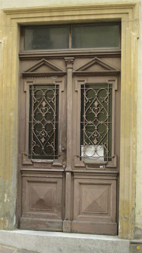Vintage Spanish Style Wooden Door with Iron Grills