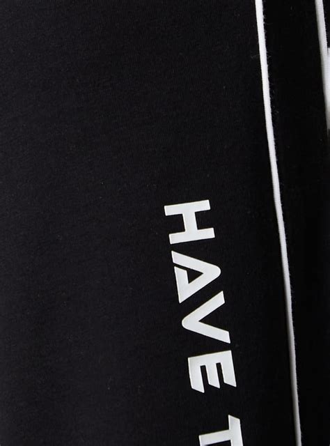 Buy Women Side Striped Wide Leg Trousers Online at just Rs. 999.0 ...