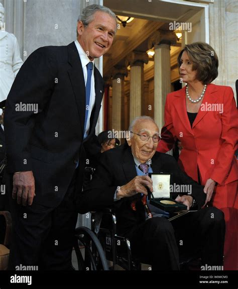 Heart surgeon Dr. Michael DeBakey (C), pictured on April 23, 2008 with ...