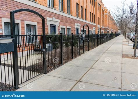 Black Fence in Front of a Long Row of Homes in the West Loop ...