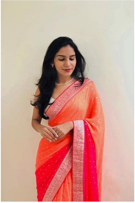 Orange Heavy Georgette All Over Saree In Two Tone Color With Weaving B ...