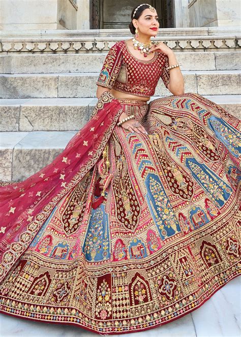MAROON RED HEAVY EMBROIDERED DESIGNER BRIDAL LEHENGA – zarikaariindia.com
