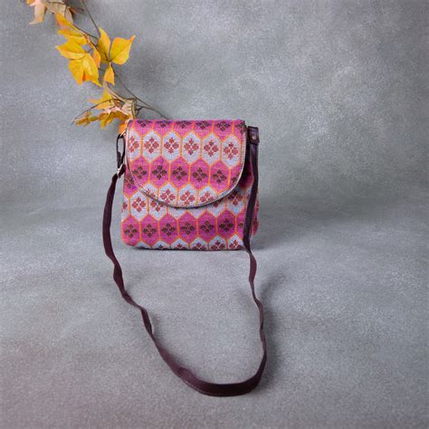 Regular Slings Blue with Maroon Colour Round Flap Design.r. – lakshya bags
