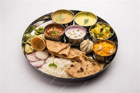 Premium Photo | Maharashtrian food Thali or platter. Mumbai style Meal ...