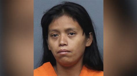 Woman accused of leaving children home alone before house catches fire