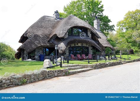 House with Mushroom Cap Style Roof in Charlevoix Michigan Editorial ...