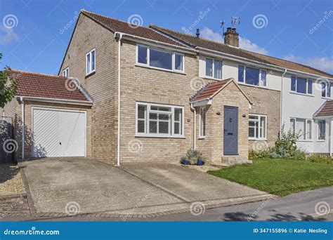 Exterior Of Typical UK Semi Detached House Or Home Viewed From Front Elevation With Garage Stock ...