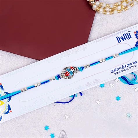 Send Stunning Set of Three Silver Rakhi for Brothers Online ...