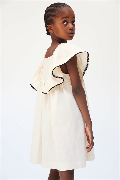 Butterfly-sleeved jersey dress - Cream - Kids | H&M IN