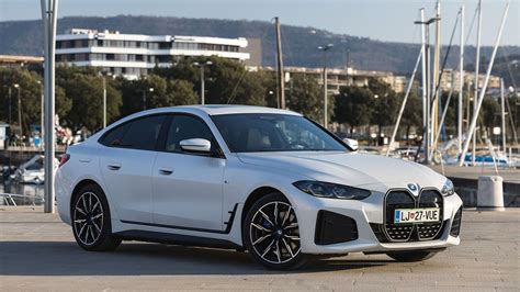 BMW i4 electric sedan with 590km range launched in India: All details ...