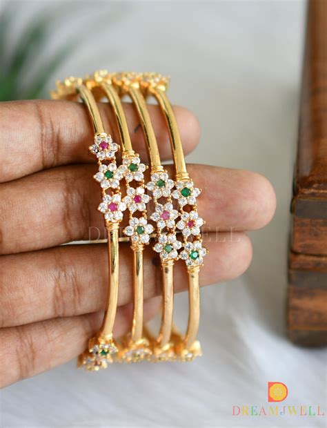 DREAMJWELL - Beautiful Gold Tone Cz Ruby-green nakshatra Designer Se ...
