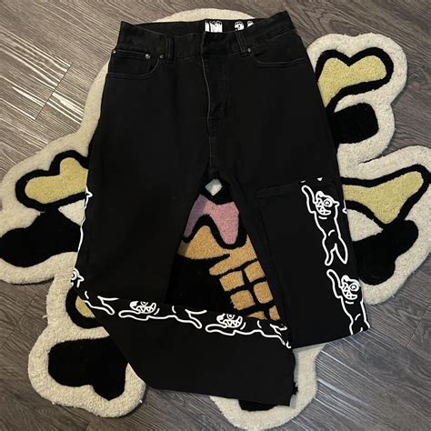 Black ice cream jeans with white painted running... - Depop