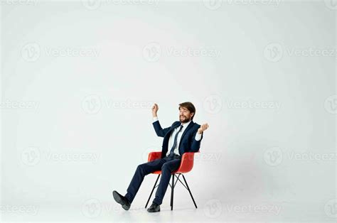 Suit Man Sitting 的图像结果