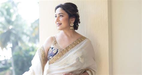 Madhuri Dixit Nene’s ivory and cream Punit Balana sari is made with the ...