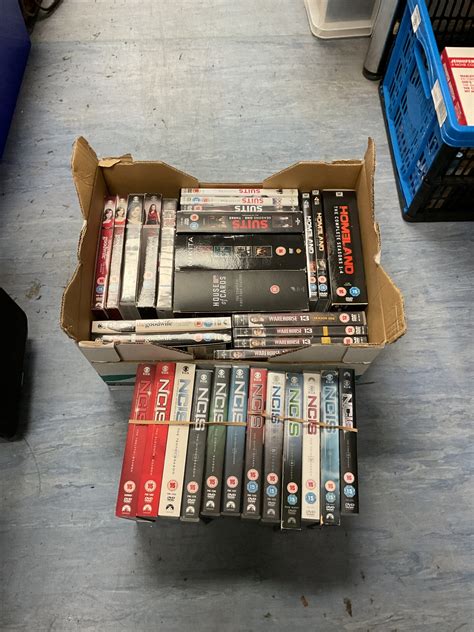 Box of dvds including ncis & house of cards – Badgers Auctions