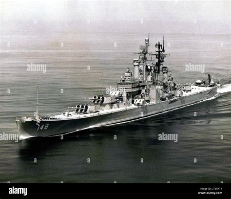 USS Newport News (CA-148) underway in the Atlantic Ocean, in August ...