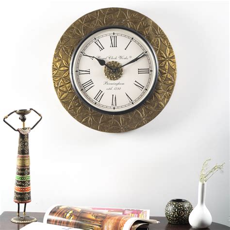 Buy VEDAS Wheel Metal Wall Clock - 30cm from Vedas at just INR 4299.0