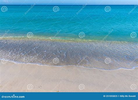 Waves Washing Over the White Sand of Coquina Beach Stock Image - Image ...