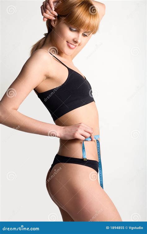 Woman Measuring Her Waist with a Tape Measure Stock Image - Image of ...