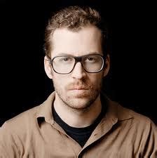 Thomas Lélu holding signature note handwritten on W Hotels paper