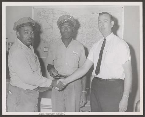 [Two Greyhound Employees] - Side 1 of 2 - The Portal to Texas History