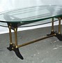 Image result for Black Glass with Antique Brass Coffee Tables
